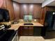 The modern kitchen boasts granite countertops, ample cabinet space, and stainless steel appliances, perfect for culinary enthusiasts at 425 30Th W Ave # C112, Bradenton, FL 34205