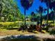 Scenic view of pond with lush landscaping at 425 30Th W Ave # C112, Bradenton, FL 34205