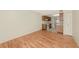 View of an open living and kitchen area features wood and tile flooring at 425 30Th W Ave # C208, Bradenton, FL 34205