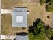 Aerial view showcasing the house, roof, lawn and the surrounding neighborhood at 425 Skylark Nw Ln, Port Charlotte, FL 33952