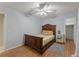 Bedroom featuring wood floors, ceiling fan, and closet at 4655 Payne St, North Port, FL 34287