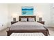 Spacious main bedroom with a turtle art print on the wall at 4711 Cedron Ct, Sarasota, FL 34240