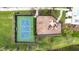 Aerial view of the community playground featuring a basketball court and play area at 4711 Cedron Ct, Sarasota, FL 34240
