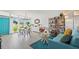 Bright living room with modern furnishings, large windows, and stylish decor, perfect for entertaining at 4801 Sarasota Ave, Sarasota, FL 34234