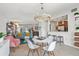 Inviting living room with dining area, breakfast bar, and comfortable seating at 4801 Sarasota Ave, Sarasota, FL 34234