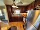 Modern kitchen featuring stainless steel appliances, granite countertops and hardwood floors at 5515 Denmark Dr, Bradenton, FL 34207