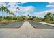 Bocce ball courts with pavers and surrounding landscape at 5673 Piccolo St, Nokomis, FL 34275