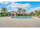 Beautiful community pool with inviting lounge area and well-maintained landscaping, perfect for relaxation at 5673 Piccolo St, Nokomis, FL 34275