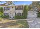 Two-story home featuring well-maintained landscaping and an attached two-car garage at 5766 Forester Pine Ct, Sarasota, FL 34243