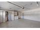 Spacious garage with a laundry area featuring a washer and dryer, plus ample storage at 5766 Forester Pine Ct, Sarasota, FL 34243