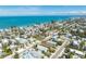 Breathtaking aerial view captures this neighborhood and its proximity to pristine, turquoise ocean waters at 612 Fern St, Anna Maria, FL 34216