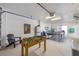 Spacious game room equipped with a foosball table and ping pong table, offering entertainment for all ages at 612 Fern St, Anna Maria, FL 34216