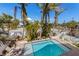 A tranquil pool area surrounded by lush greenery, perfect for relaxation and leisure at 612 Fern St, Anna Maria, FL 34216