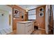 Kitchen island with storage and stainless steel refrigerator, showcasing modern design at 631 Woodlawn Dr, Bradenton, FL 34210