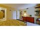 This large bedroom is well-lit and includes access to a private bathroom at 631 Woodlawn Dr, Bradenton, FL 34210