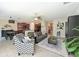 Spacious living area seamlessly connecting the kitchen and dining area, great for entertaining at 6723 Trent Creek Dr, Sun City Center, FL 33573