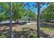 Scenic park featuring a gazebo with a picnic table, perfect for enjoying outdoor activities and relaxation at 6723 Trent Creek Dr, Sun City Center, FL 33573