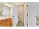 Bright bathroom with a toilet and vanity, conveniently located off the bedroom at 7180 83Rd E Dr # 6-5, Bradenton, FL 34201