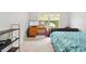 Comfortable bedroom featuring a desk, and plenty of space at 7180 83Rd E Dr # 6-5, Bradenton, FL 34201