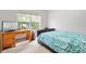 Comfortable bedroom featuring a desk, and plenty of space at 7180 83Rd E Dr # 6-5, Bradenton, FL 34201