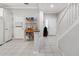 Inviting entryway with tile floors, bright walls, and staircase access to the upper level at 7180 83Rd E Dr # 6-5, Bradenton, FL 34201