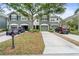 Charming townhome featuring well-maintained landscaping, a two-car garage, and a welcoming entrance at 7180 83Rd E Dr # 6-5, Bradenton, FL 34201
