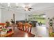 Bright living room with screened patio view, comfortable seating, and stylish furnishings at 7180 83Rd E Dr # 6-5, Bradenton, FL 34201