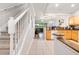 Staircase view into living and dining spaces featuring an open floor plan and natural light at 7180 83Rd E Dr # 6-5, Bradenton, FL 34201