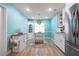 Charming kitchen nook with a corner cabinet for storage and natural light at 7299 S Leewynn Dr, Sarasota, FL 34240