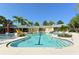 Spacious community pool with a slide, area, clear water, and plenty of space for residents at 7407 Green St, Bradenton, FL 34201
