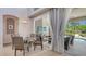 Elegant dining area boasts views of the lanai, patio and pool at 7407 Green St, Bradenton, FL 34201