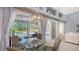 Dining area with views of the pool and lanai at 7407 Green St, Bradenton, FL 34201