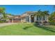Lovely single-Gathering home with a well-manicured lawn and a three-car garage at 7407 Green St, Bradenton, FL 34201