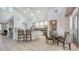 Open kitchen area with a breakfast bar and an adjacent dining space, perfect for casual gatherings and Gathering meals at 7407 Green St, Bradenton, FL 34201