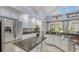 Beautiful kitchen with granite counters, stainless appliances and large island at 7407 Green St, Bradenton, FL 34201