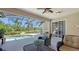 Screened lanai overlooking the pool and lush landscaping at 7407 Green St, Bradenton, FL 34201
