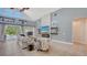 Comfortable living room with a modern electric fireplace and stylish decor at 7407 Green St, Bradenton, FL 34201