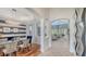 Open-concept living space with arched entryways and a clear view of the dining area and living room at 7407 Green St, Bradenton, FL 34201