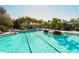 A large community pool with beach style entry and splash pad at 7407 Green St, Bradenton, FL 34201