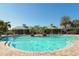 Beautiful community pool with a covered seating area and a relaxing atmosphere at 7407 Green St, Bradenton, FL 34201