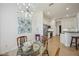 Dining area near kitchen, adorned with decor and modern chandelier at 7554 Camden Harbour Dr, Bradenton, FL 34212