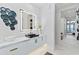 Modern bathroom featuring marble counters, a black sink, stylish decor and view to the water at 800 Blue Shell Loop, Sarasota, FL 34240