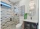 Modern bathroom featuring stylish tile, an oversized shower head, and modern fixtures at 800 Blue Shell Loop, Sarasota, FL 34240
