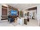 Bright living room features a fireplace, marble accent wall, recessed lights, and an open layout at 800 Blue Shell Loop, Sarasota, FL 34240