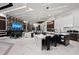 Expansive open-concept featuring living room, gourmet kitchen, and dining area at 800 Blue Shell Loop, Sarasota, FL 34240