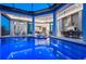 Stunning pool and spa with an outdoor kitchen perfect for entertaining in style at 800 Blue Shell Loop, Sarasota, FL 34240