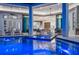 Beautiful pool and spa connect seamlessly to indoor living spaces for an open feel at 800 Blue Shell Loop, Sarasota, FL 34240