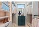 A well-organized walk-in closet with custom shelves, drawers, and ample storage for clothing and accessories at 800 Blue Shell Loop, Sarasota, FL 34240