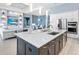 Spacious kitchen with large island, modern appliances, and open concept design at 8335 Sea Glass Ct, Sarasota, FL 34240