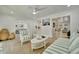 Bright living room with stylish furniture, open floor plan, and plenty of natural light at 8419 Sylvan Woods Dr, Sarasota, FL 34243